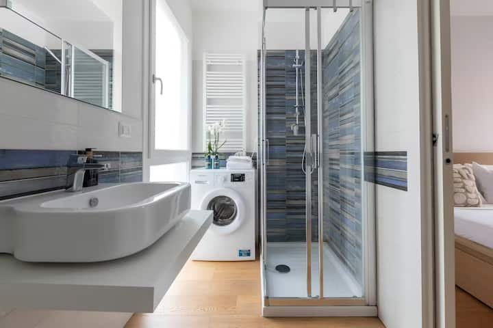 Casa Giada | Moderno Central 1BR + Estacionamento Fechado