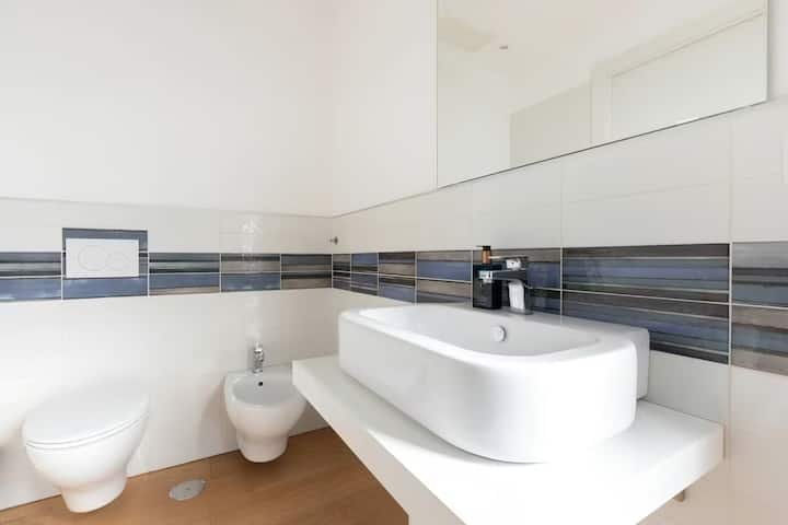 Casa Giada | Moderno Central 1BR + Estacionamento Fechado