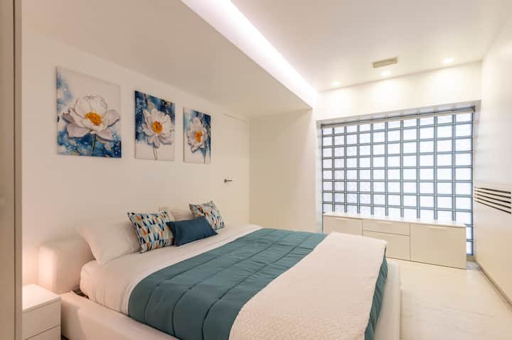 Addaura Home um terraço com vista para o mar