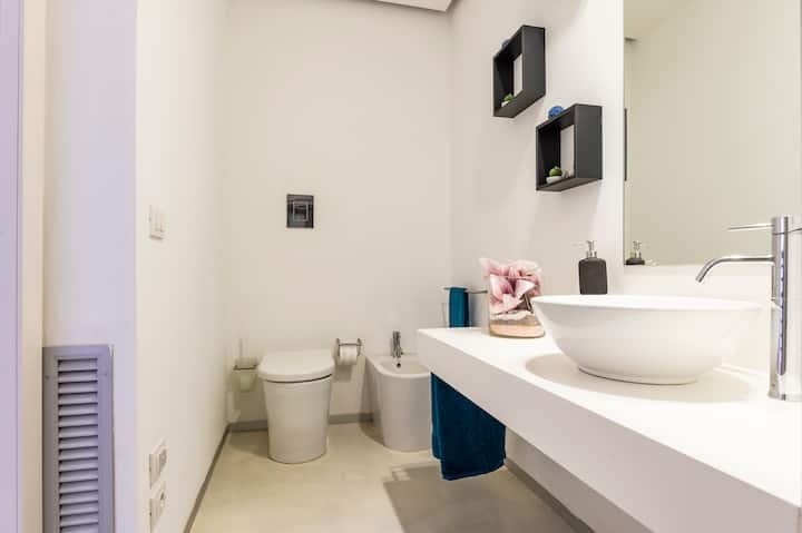 Addaura Home um terraço com vista para o mar