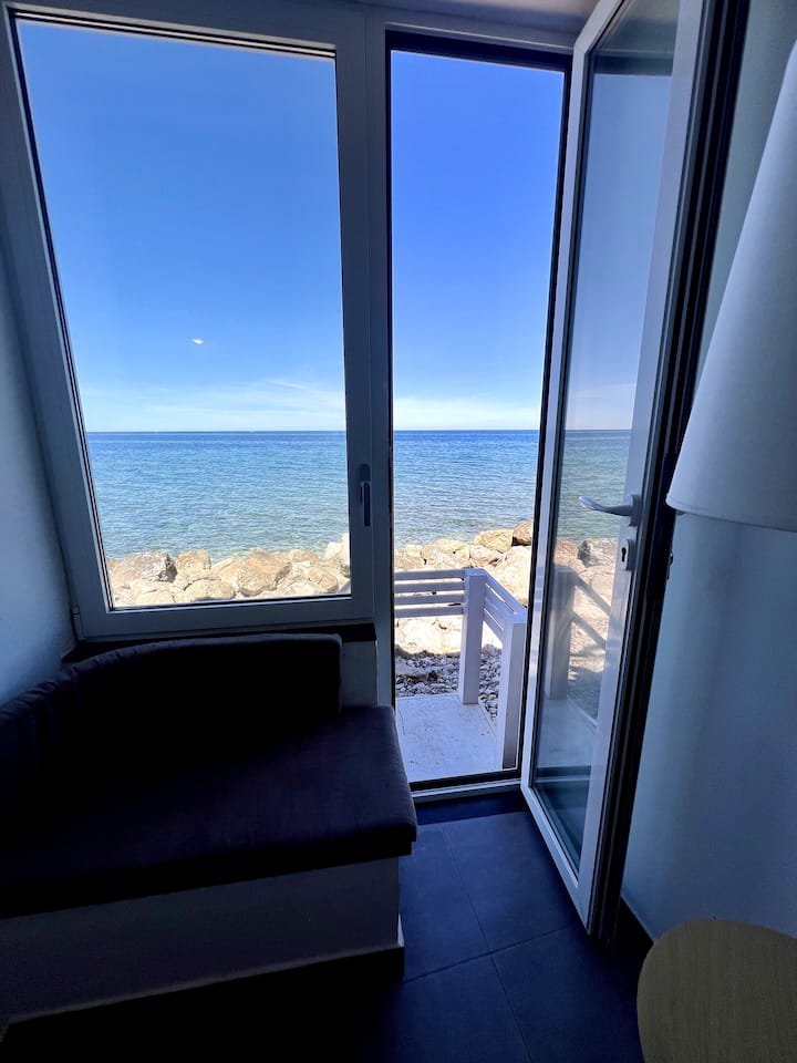 Loft à beira-mar, com acesso privativo à praia